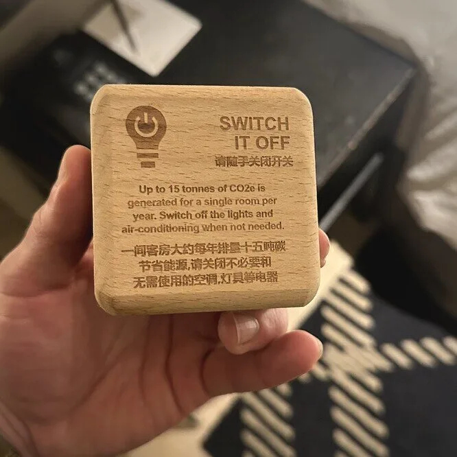 Wooden block with text in two languages